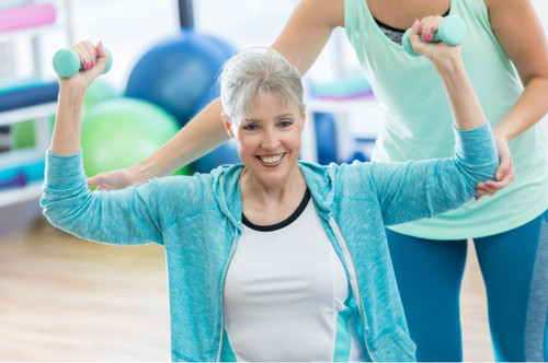 Image of a lady undergoing a personal or private workout session.