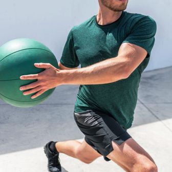 Image of a fitness client performing a multiplanar exercise.