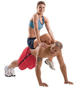 Image of a couple exercising together. 
