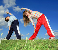 Photo of two kids doing a fitness workout.