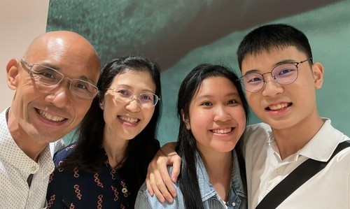 Photo of Rick Wong with his family.