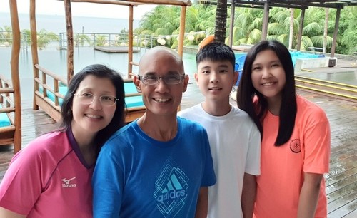 Photo of Rick Wong with his family.